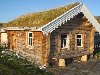 Russian Log House with sod roof /     